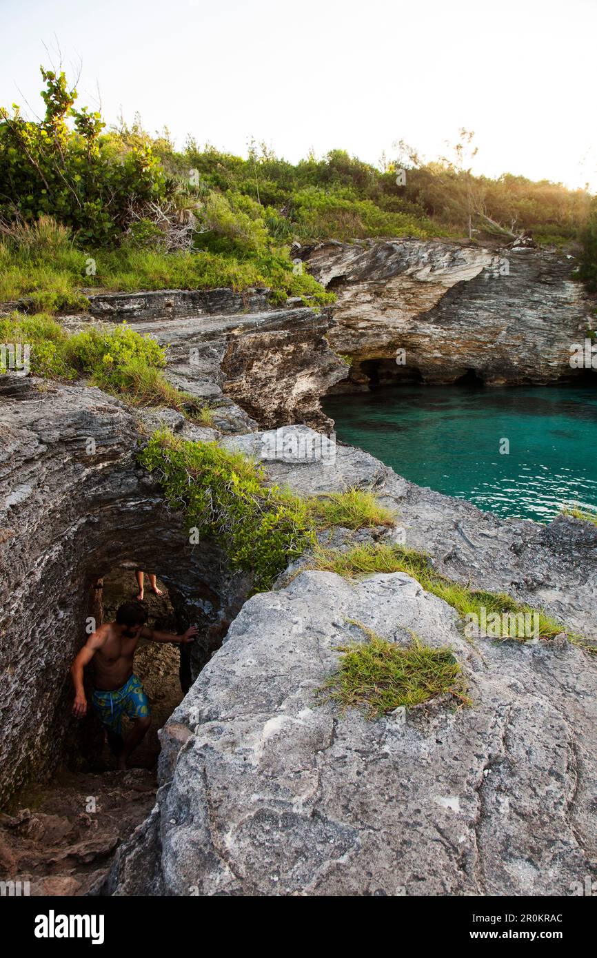 BERMUDA. Hamilton Parish. Cliff jumping, swimming off a point in