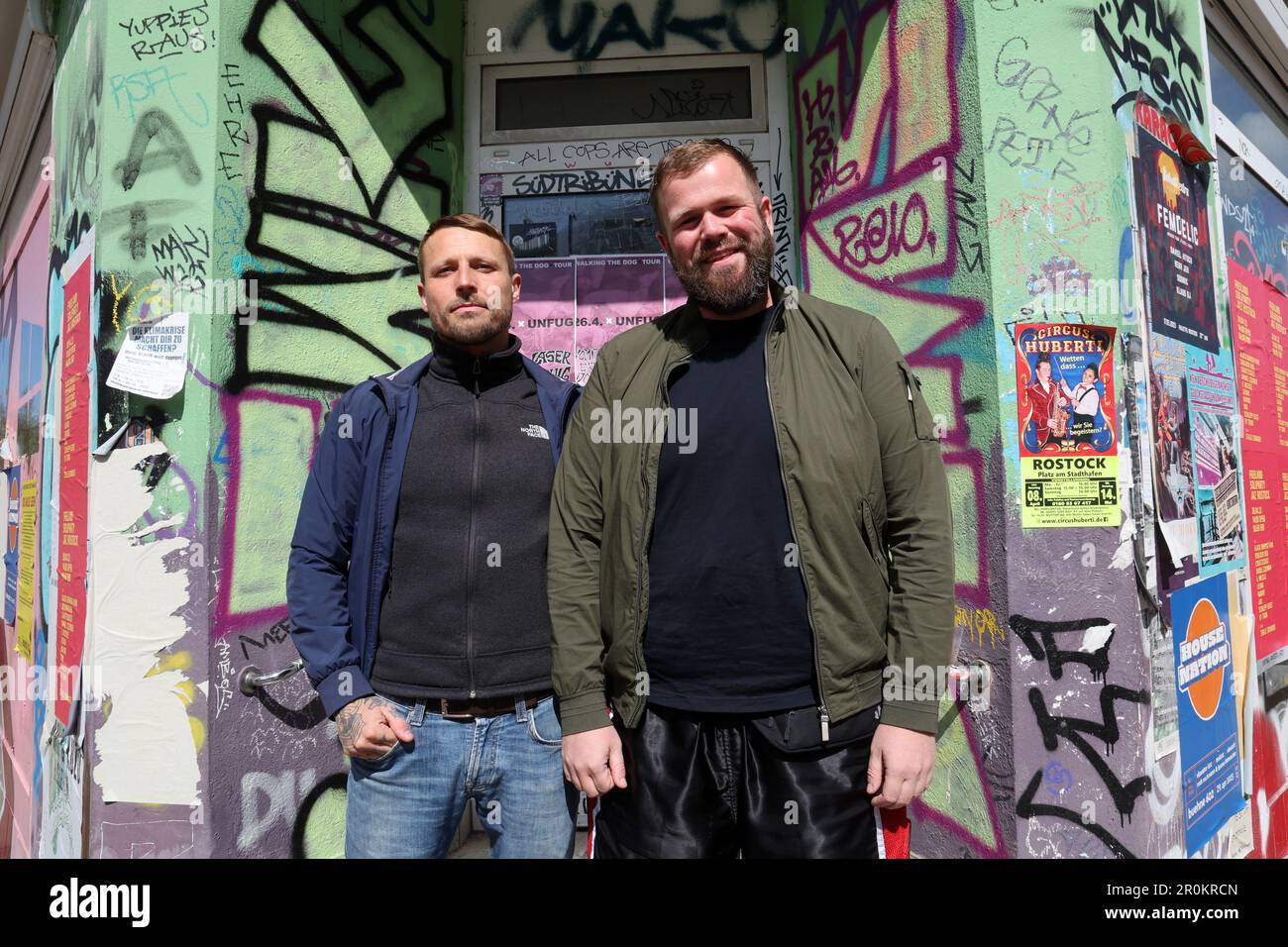 Rostock, Germany. 26th Apr, 2023. Olaf Ney (l-r), drummer, and Jan Monchi  Gorkow, singer and frontman of the band Feine Sahne Fischfilet, in the  Kröpeliner Tor suburb KTV. The bands new album 