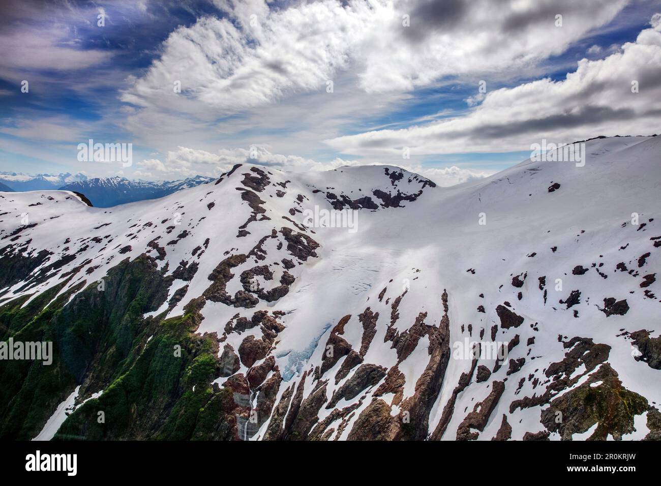 USA, Alaska, Juneau, ariel views of the beautiful Alaskan scenery seen from helicopter, the Helicopter Dogsled Tour flies you over the Taku Glacier to Stock Photo