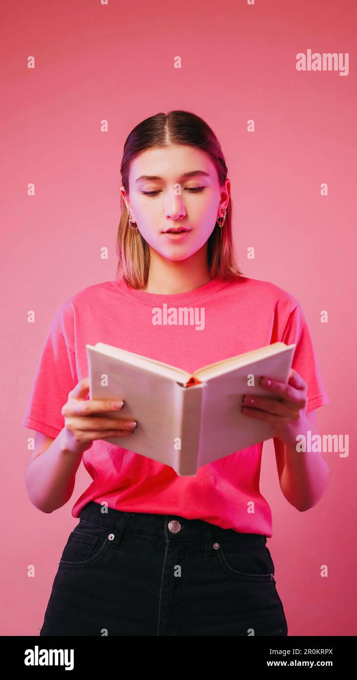Book reading learning student concentrated girl Stock Photo - Alamy