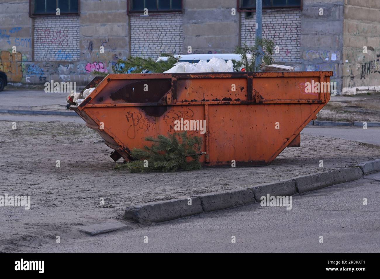 Metal boxes tanks garbage container on the street. unsorted garbage. Stock Photo