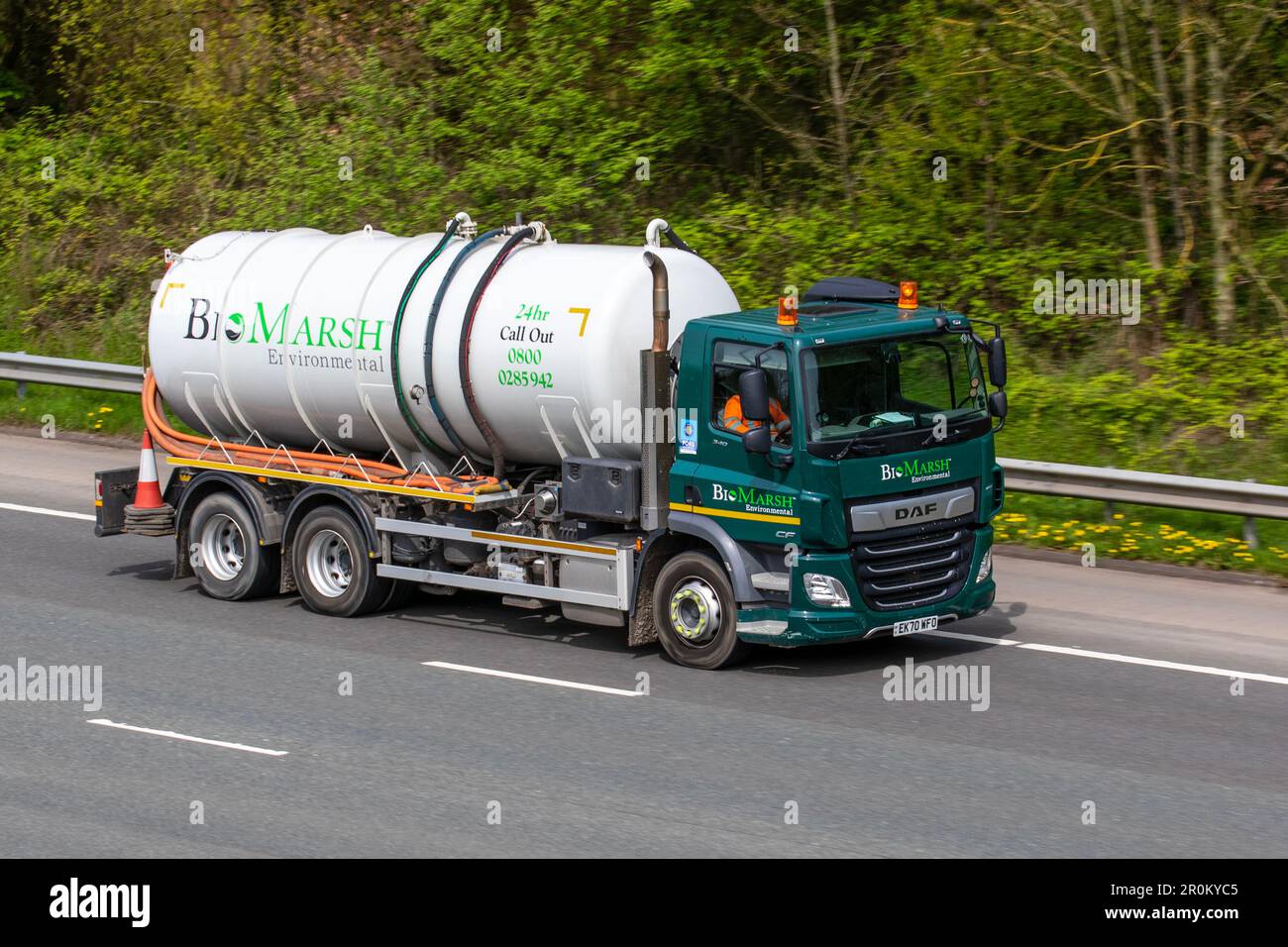 bio marsh TANKER, liquid waste disposal and the clearing of sewers, septic tanks and waste removal of sewage and hazardous waste lorry, travelling on the M61 motorway UK Stock Photo
