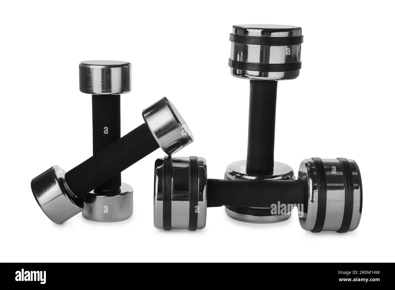 Dumbbells on white background. Weight training equipment Stock Photo