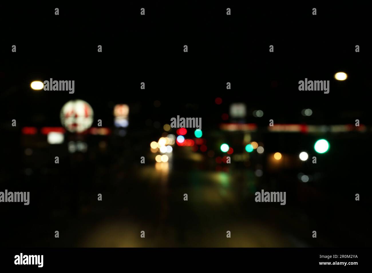 Blurred view of road with cars at night. Bokeh effect Stock Photo - Alamy