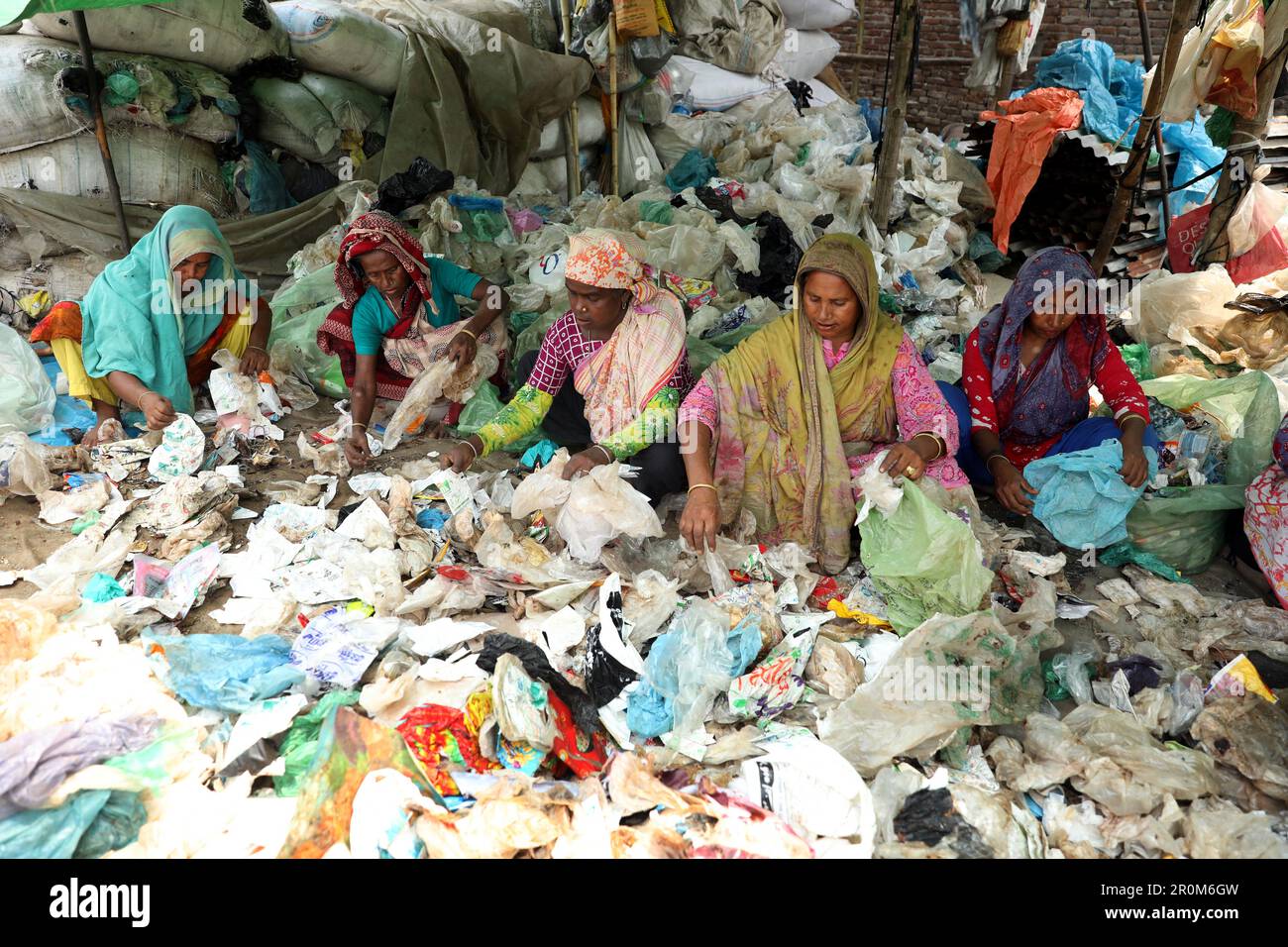 Dhaka, Bangladesh. 06th May, 2023. Women workers collects polythene