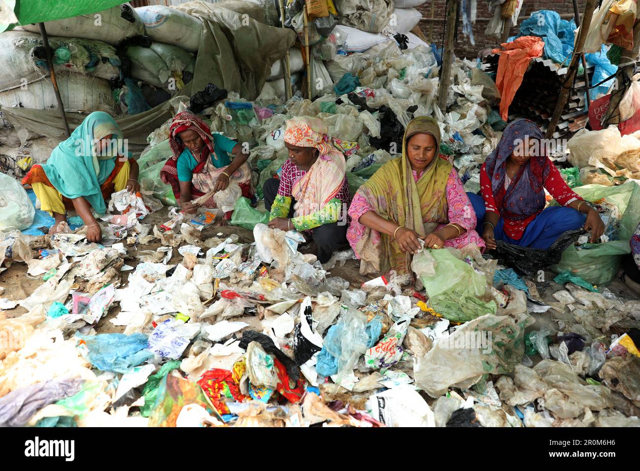 Dhaka, Bangladesh. 06th May, 2023. Women workers collects polythene