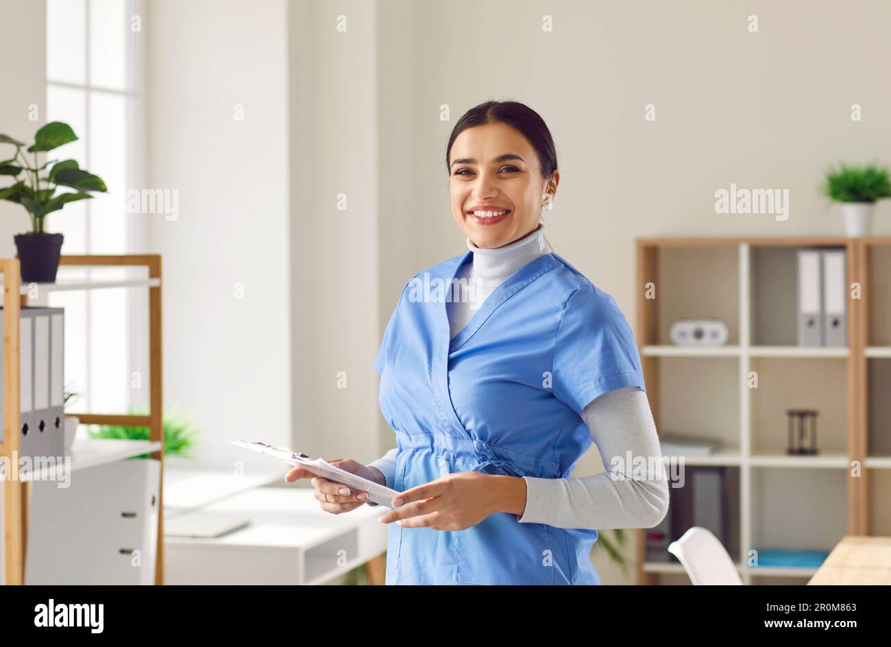 Female in blue uniform hi-res stock photography and images - Alamy