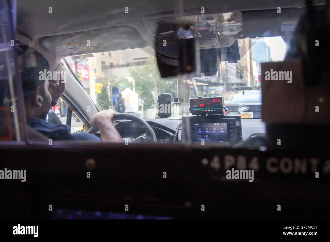 Interior of Taxi cab with Meter Running in New York City, USA Stock Photo