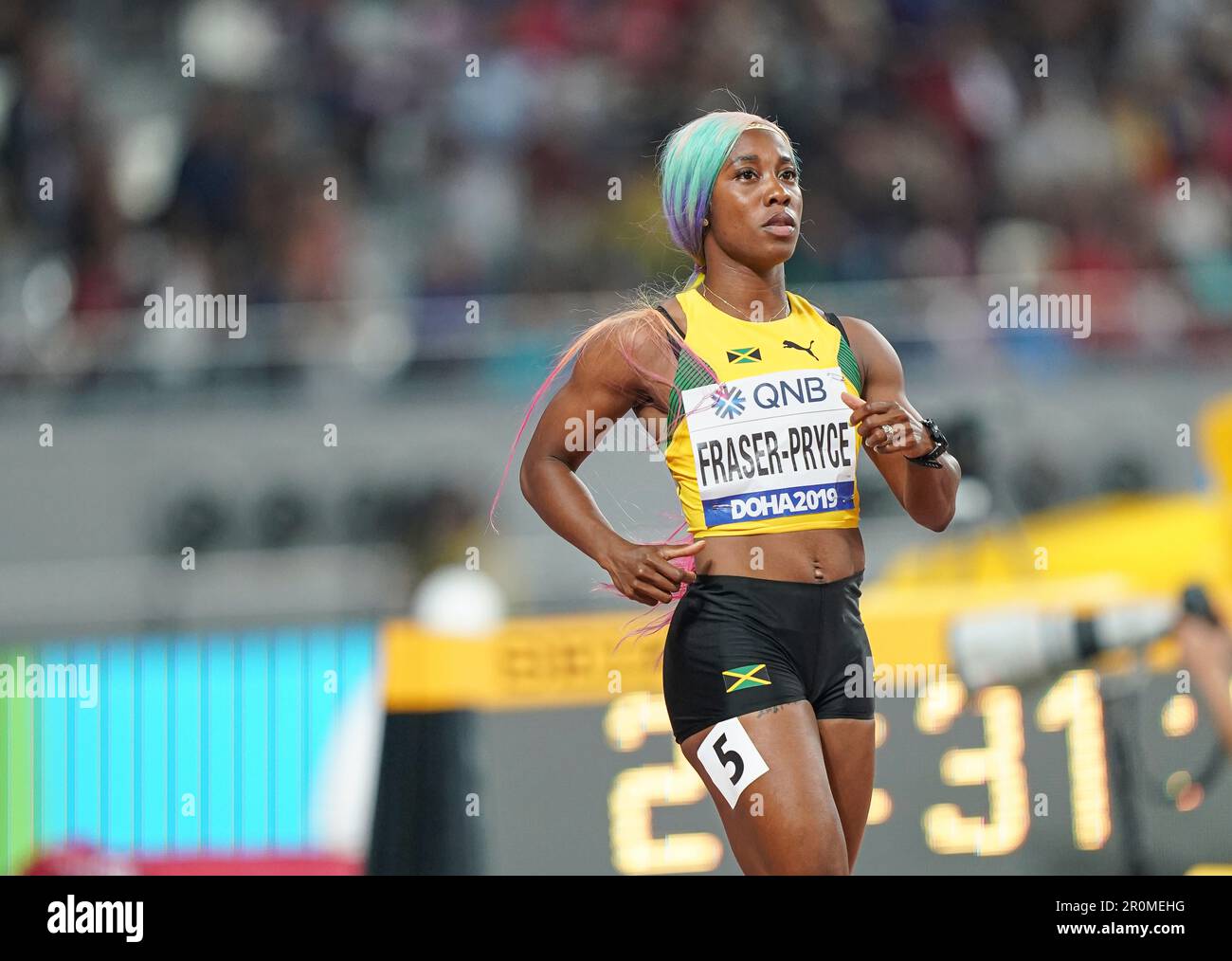 Shelly-Ann Fraser-Pryce running the 100m at the 2019 World Athletics ...