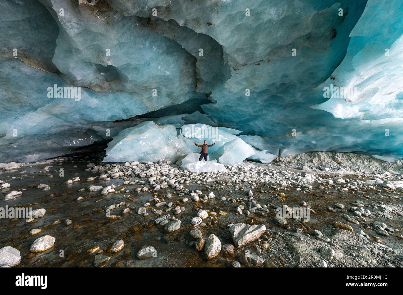 inside an blue ice cave in the swiss alps Stock Photo