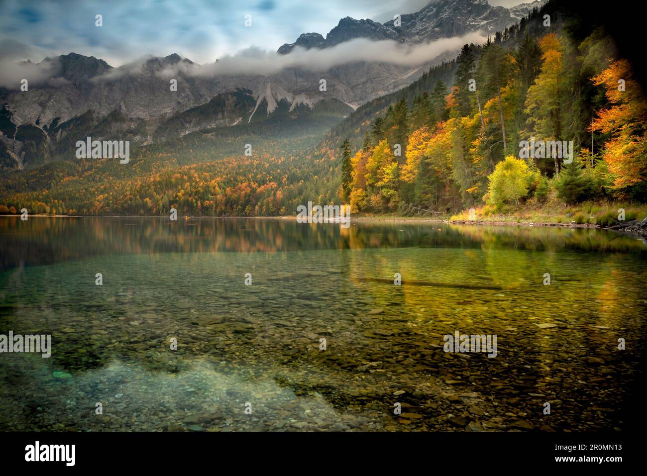 The Eibsee below the Zugspitze in the Wetterstein Mountains in Bavaria ...