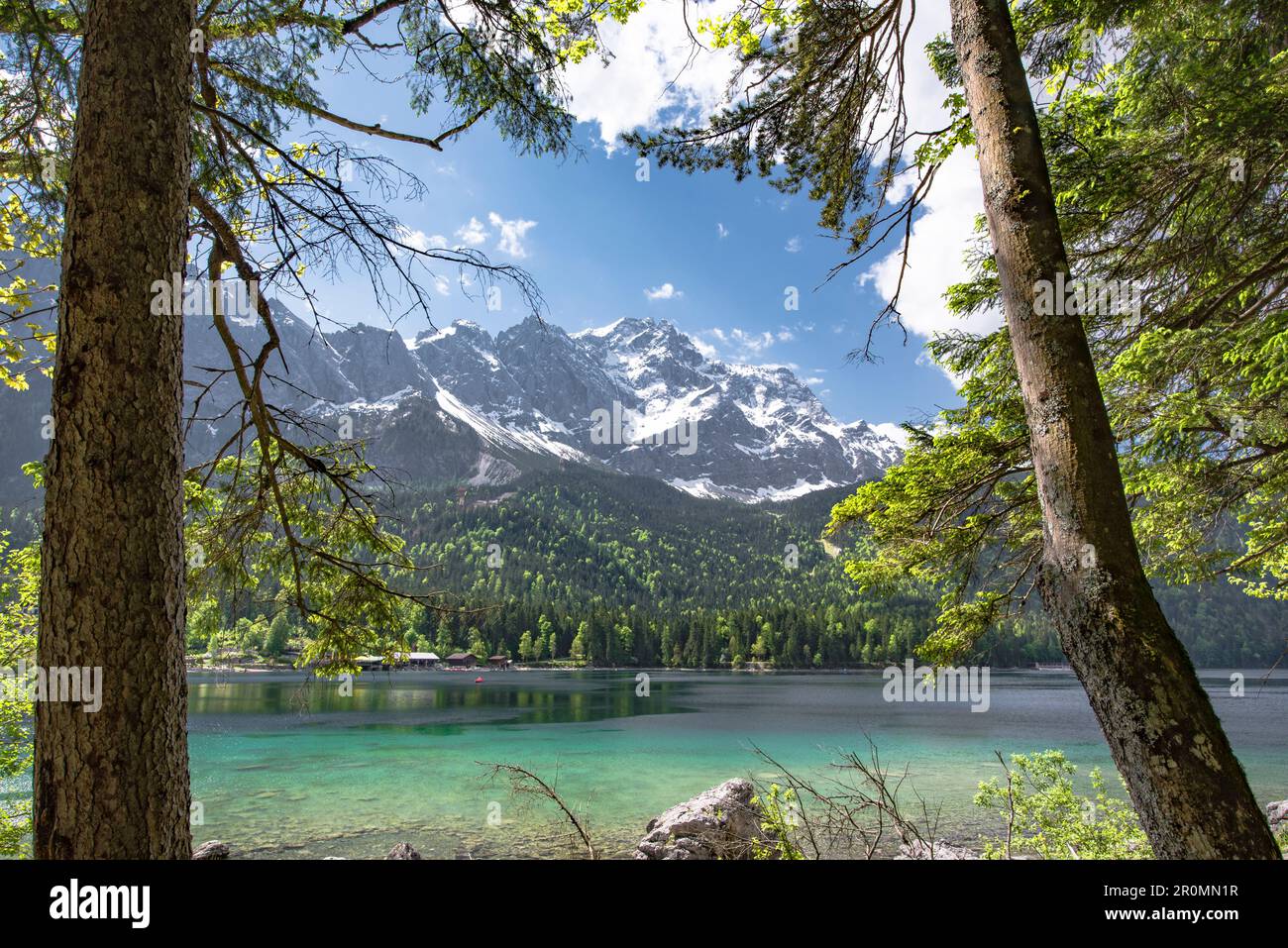 The Eibsee below the Zugspitze in the Wetterstein Mountains in Bavaria ...