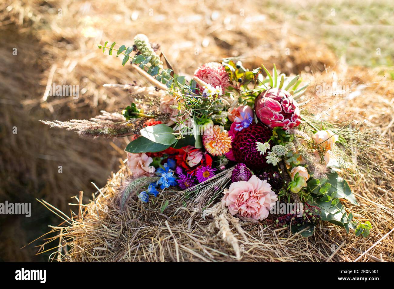 Wedding bouquet on a haystack, small rustic wedding, micro wedding, country style Stock Photo