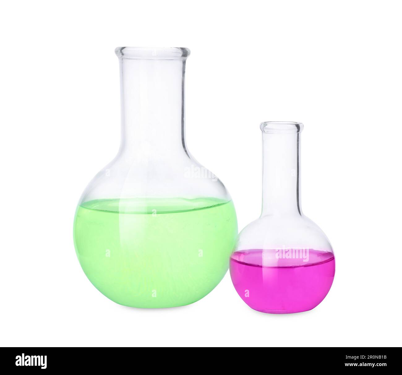 Laboratory glassware with colorful liquids on white background Stock ...