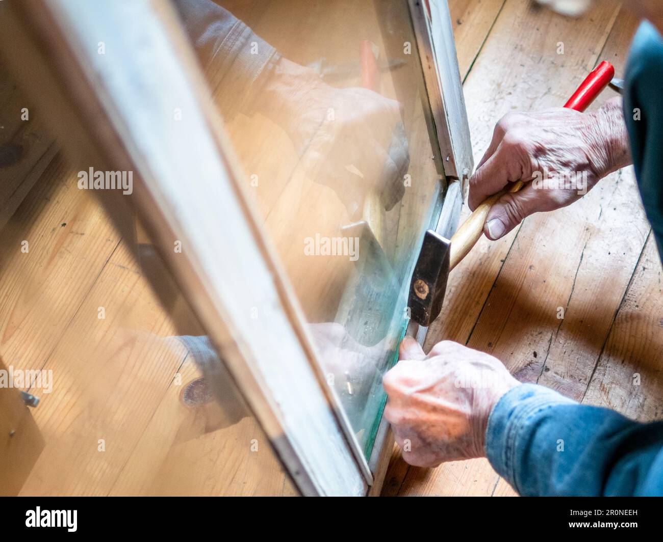 repairing old winter window frame in country house indoor Stock Photo ...