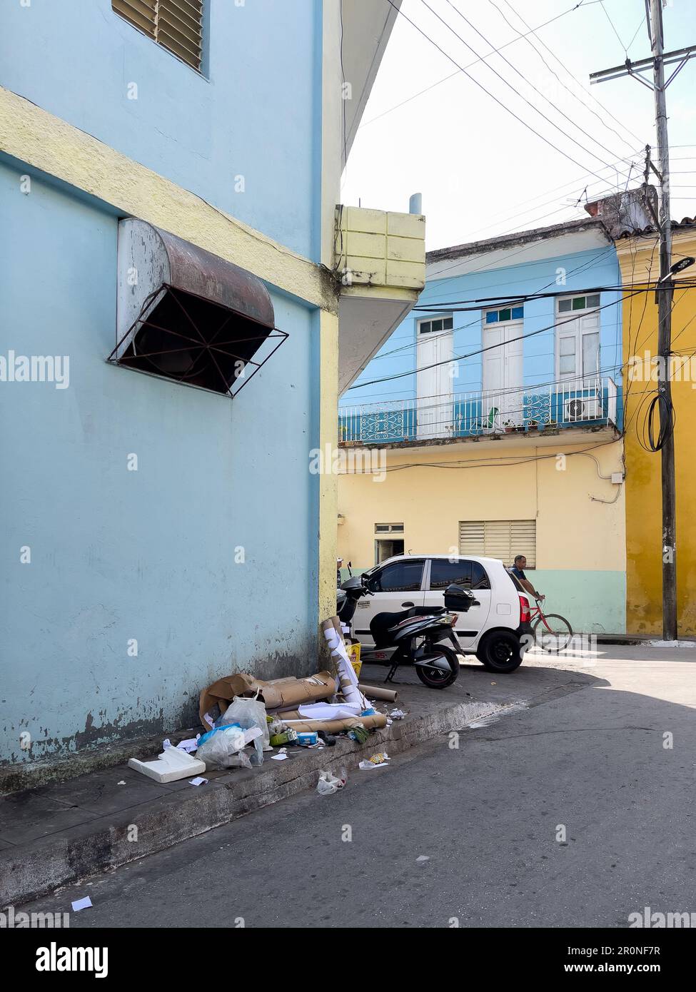 Santa Clara, Cuba 2023 Small garbage dump in a city corner Stock