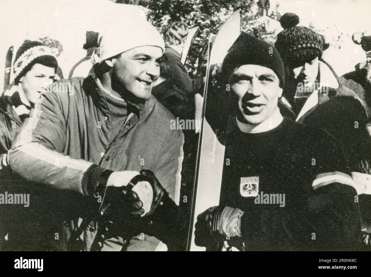 Austrian alpine ski racer Toni Sailer congratulates Karl Schranz after he won the Lauberhorn Alpine Combination, Wengen Switzerland 1966 Stock Photo