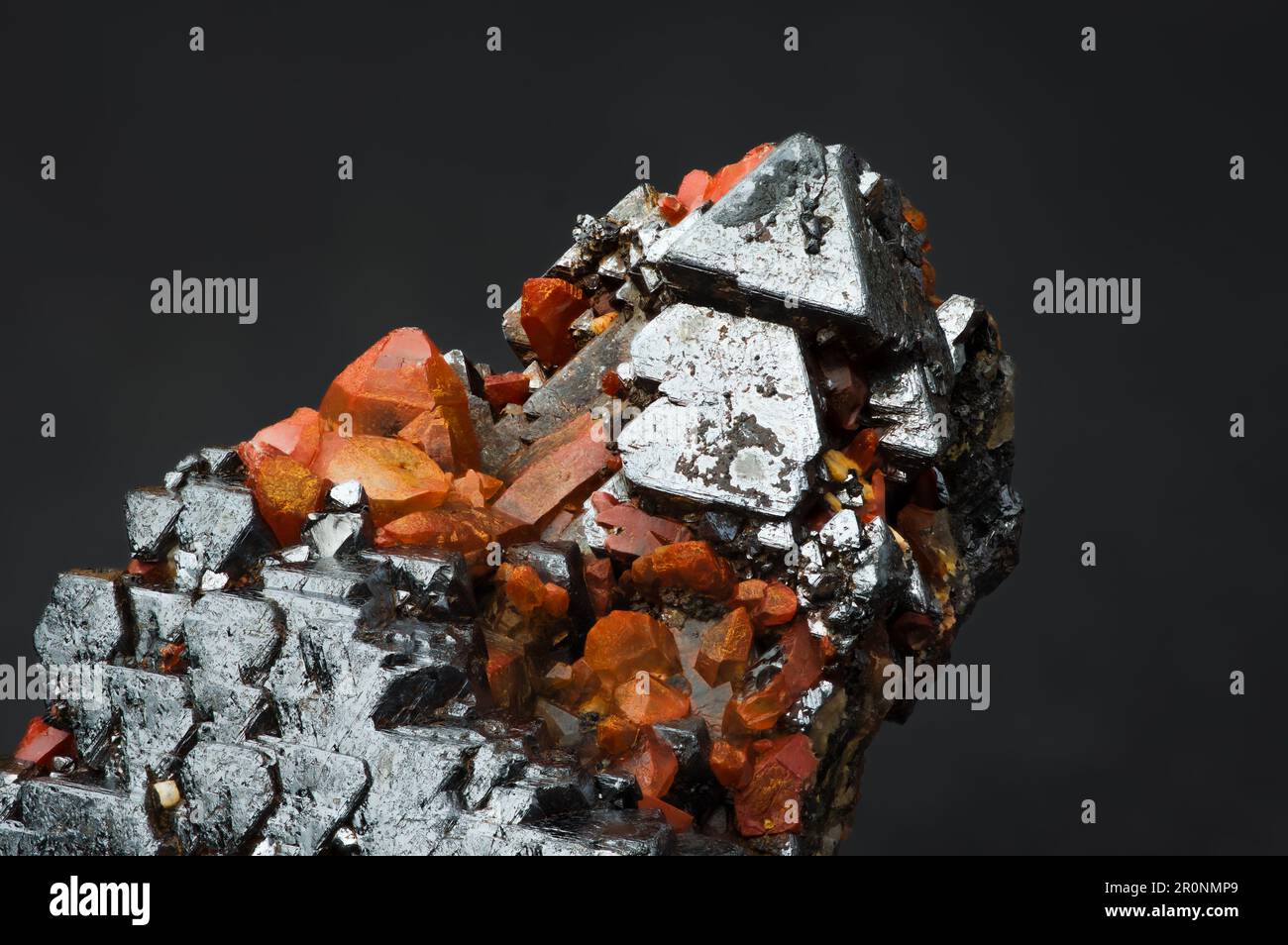 hematoid quartz on magnetite macro detail texture background. close-up raw rough unpolished semi-precious gemstone Stock Photo