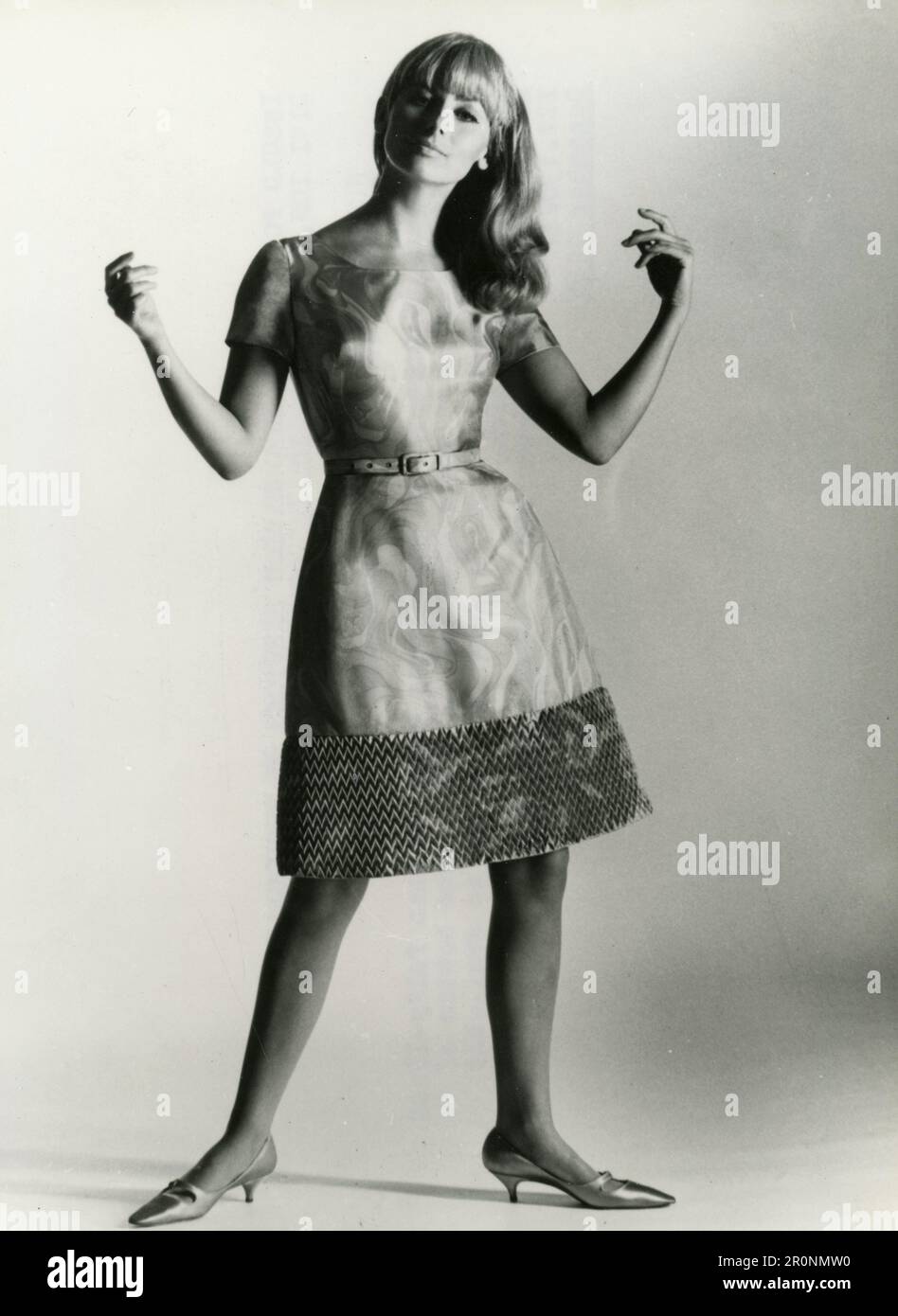 Fashion model wearing a full-lined dress in Tricel by British designer Demi-Dress, UK 1965 Stock Photo