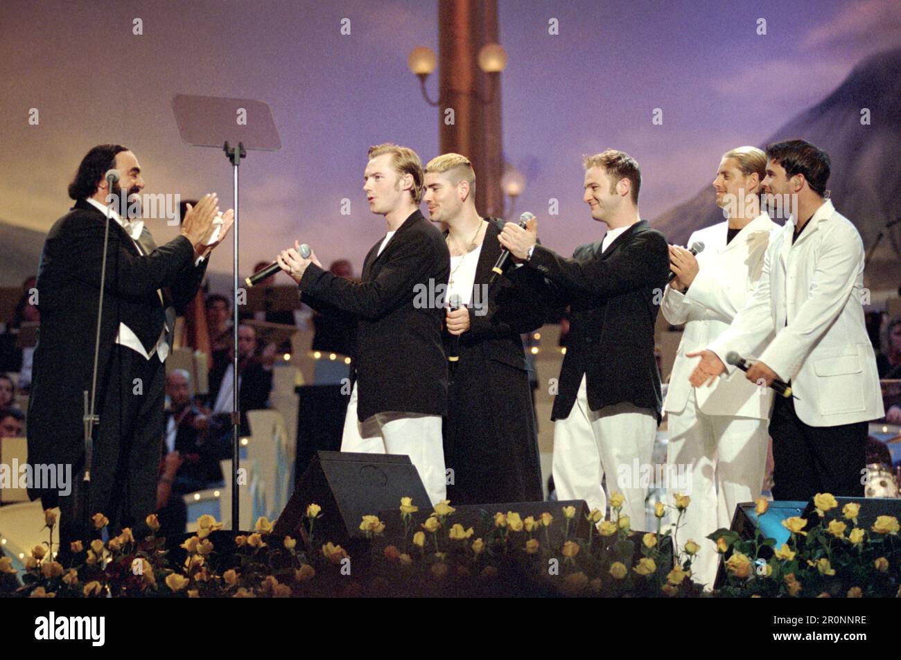 Modena  Italy 1999-06-01: Luciano Pavarotti and Boyzone in concert at the Charity event 'Pavarotti & Friends 99' in concert for Guatemala at Novi Sad Park Stock Photo