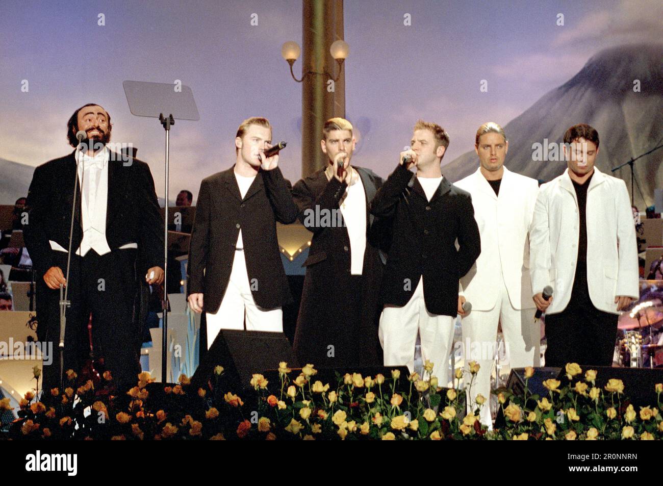 Modena  Italy 1999-06-01: Luciano Pavarotti and Boyzone in concert at the Charity event 'Pavarotti & Friends 99' in concert for Guatemala at Novi Sad Park Stock Photo
