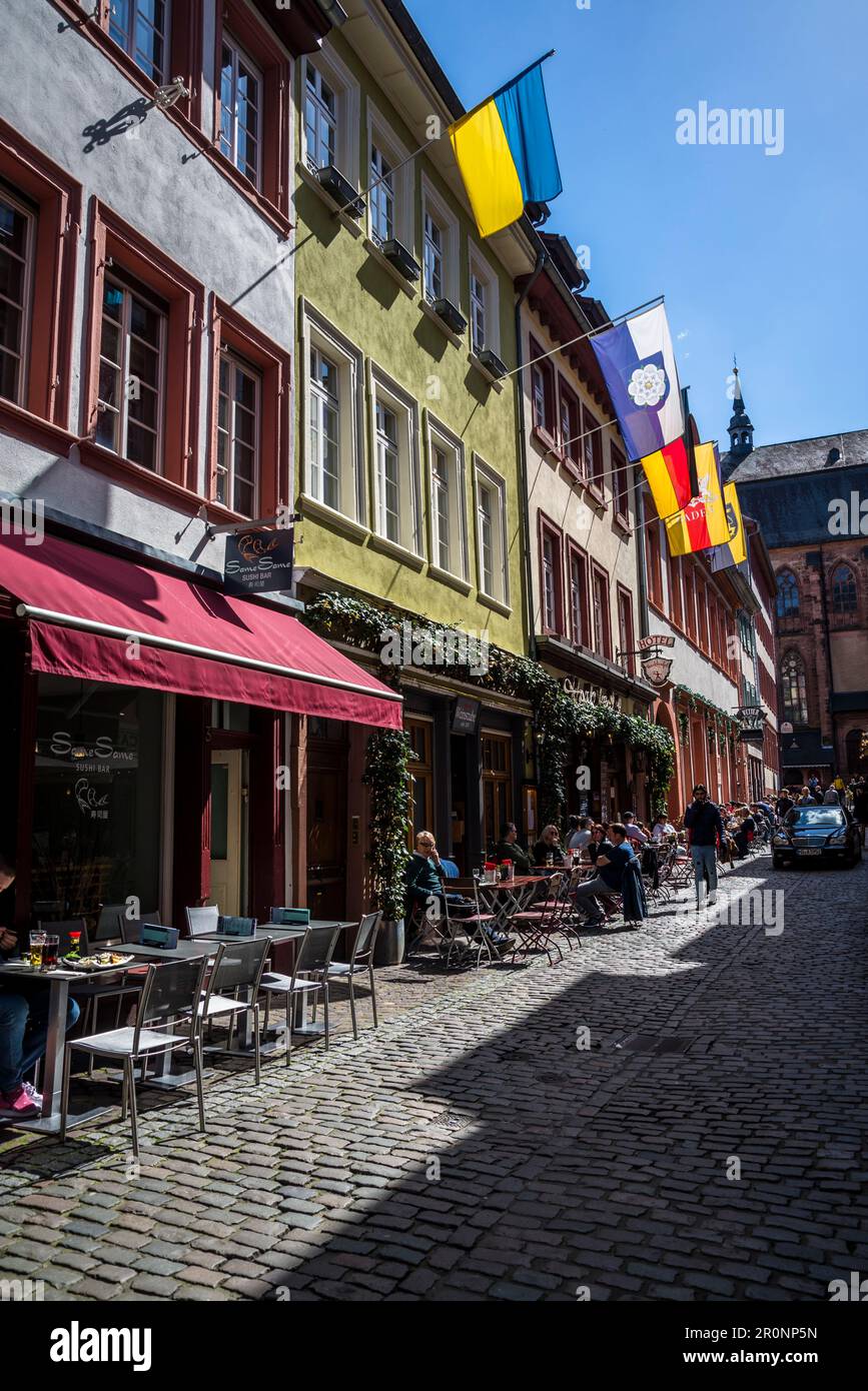 Street with cafes in the Old Town, the Altstadt, Heidelberg, Germany
