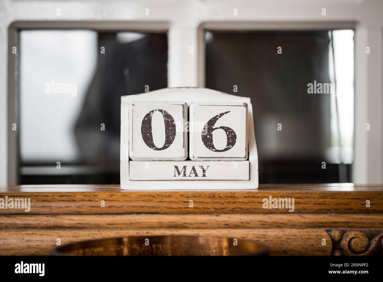 6th May date calendar wooden block showing the day of the month. Stock Photo