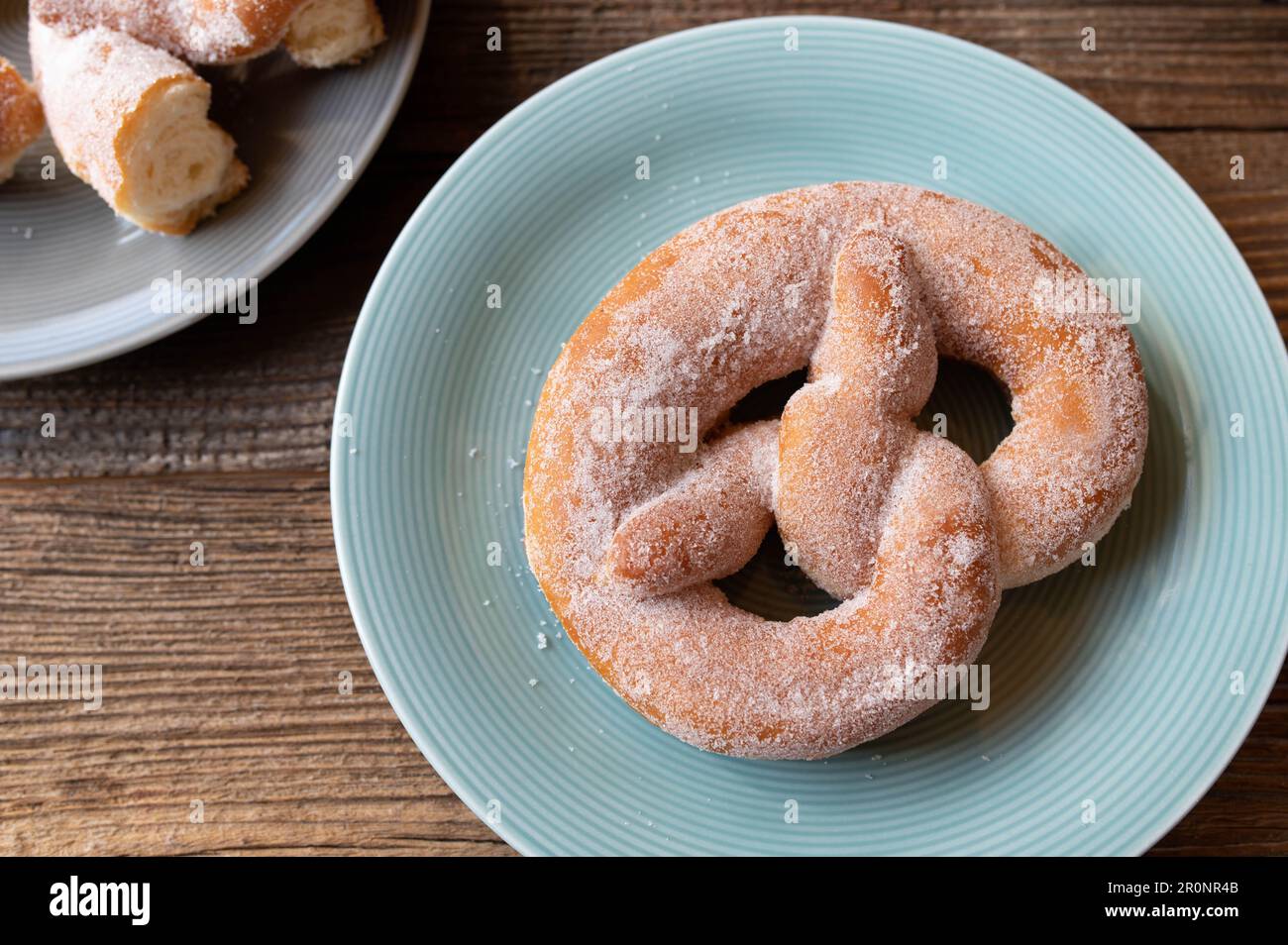Pretzel Doughnut with sugar topping Stock Photo