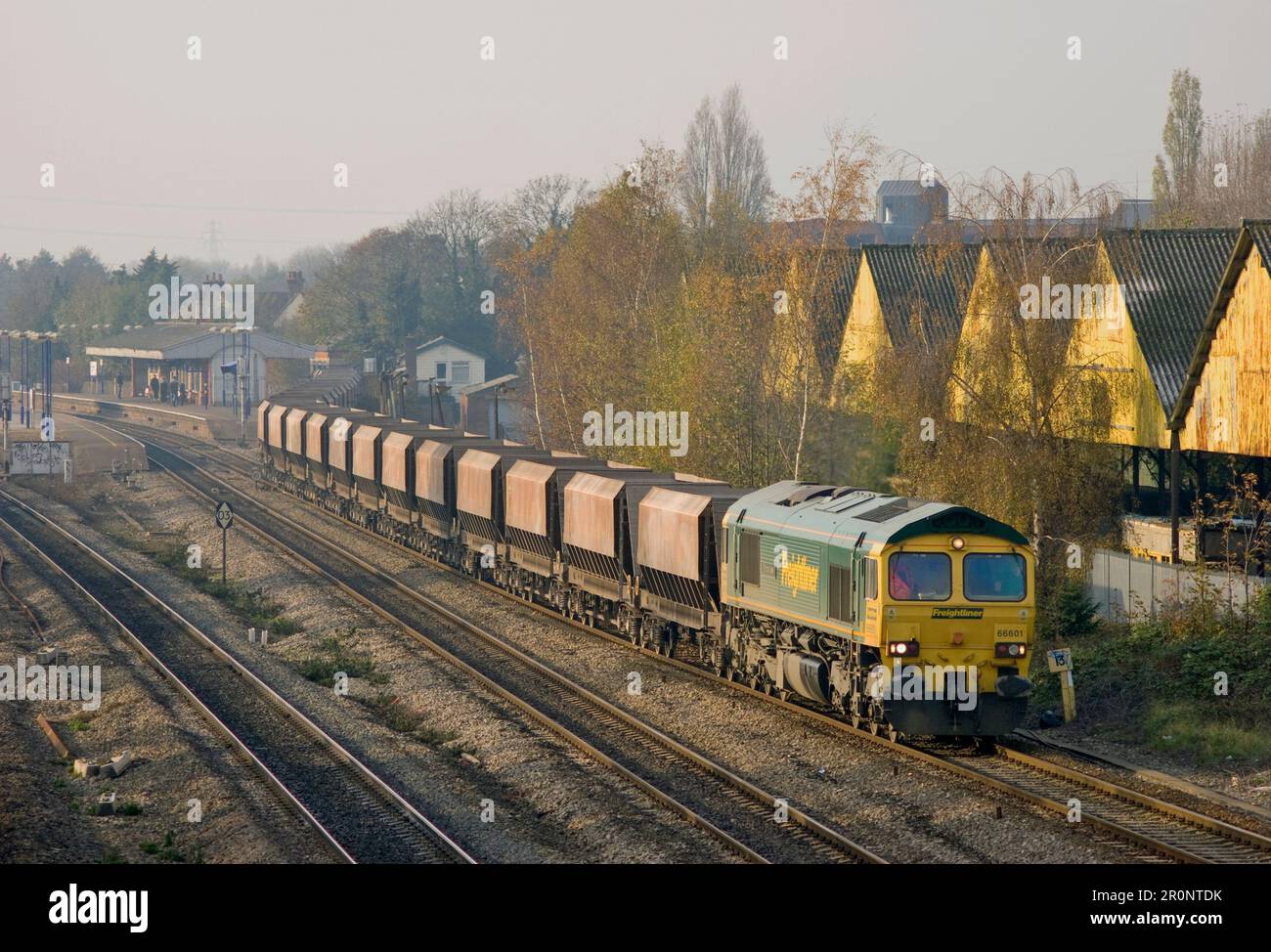 A Class Freightliner Class 66 diesel locomotive number 66601 with a train of empty stone hoppers at West Drayton on the 21st November 2005. Stock Photo