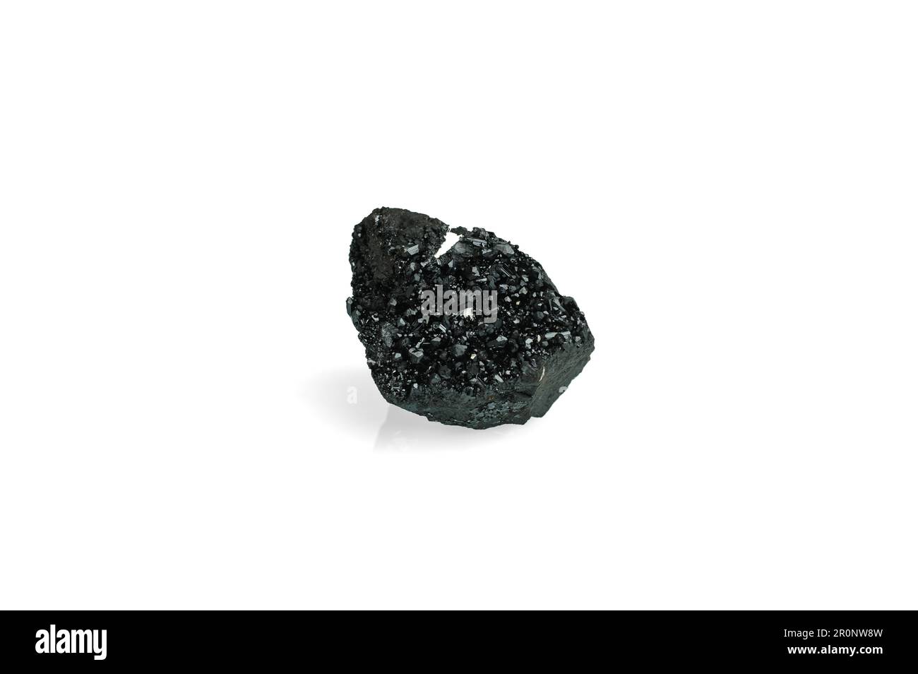 black gaudefroyite isolated on white blackground. macro detail background. close-up Rough raw unpolished semi-precious gemstone. Stock Photo