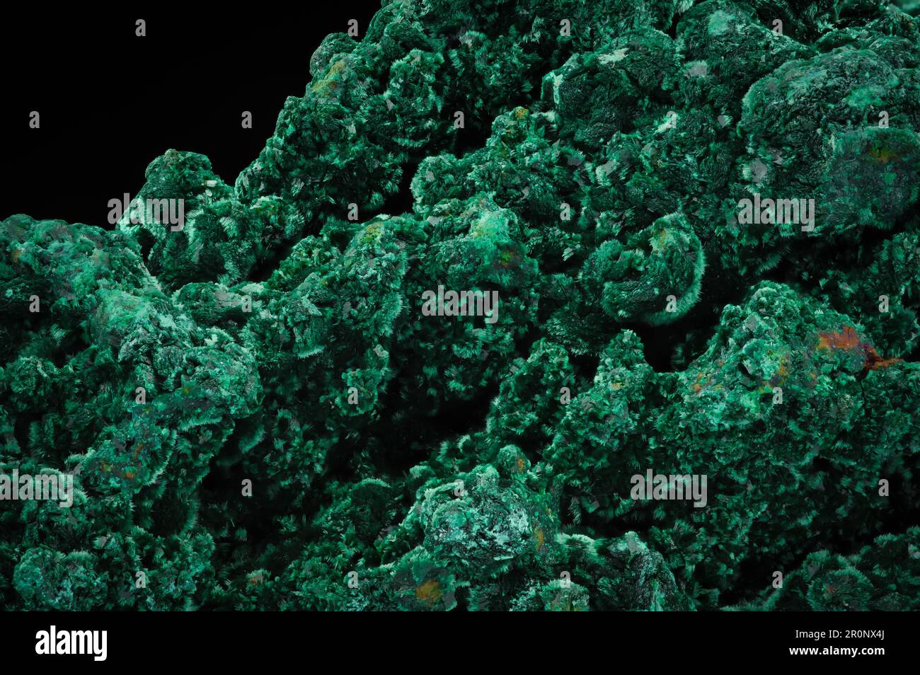 Malachite. green macro detail texture background. close-up raw rough unpolished semi-precious gemstone Stock Photo