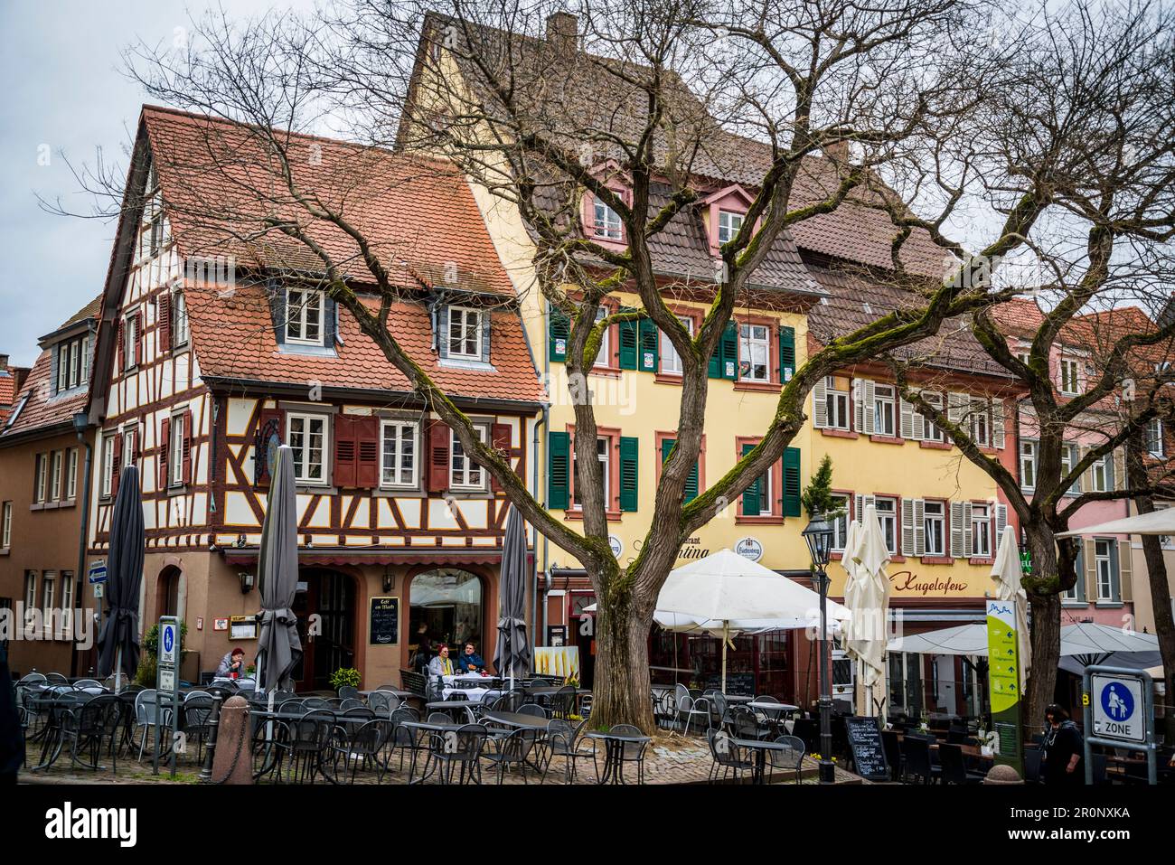 The Market Square with restaurants and old traditional medieval architecture with exposed beams, Weinheim, Baden-Württemberg, Germany Stock Photo