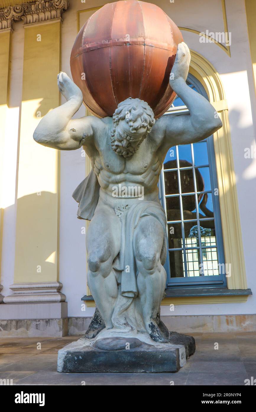 Replica of XVIIIth century sculpture of Hercules as atlas holding earth