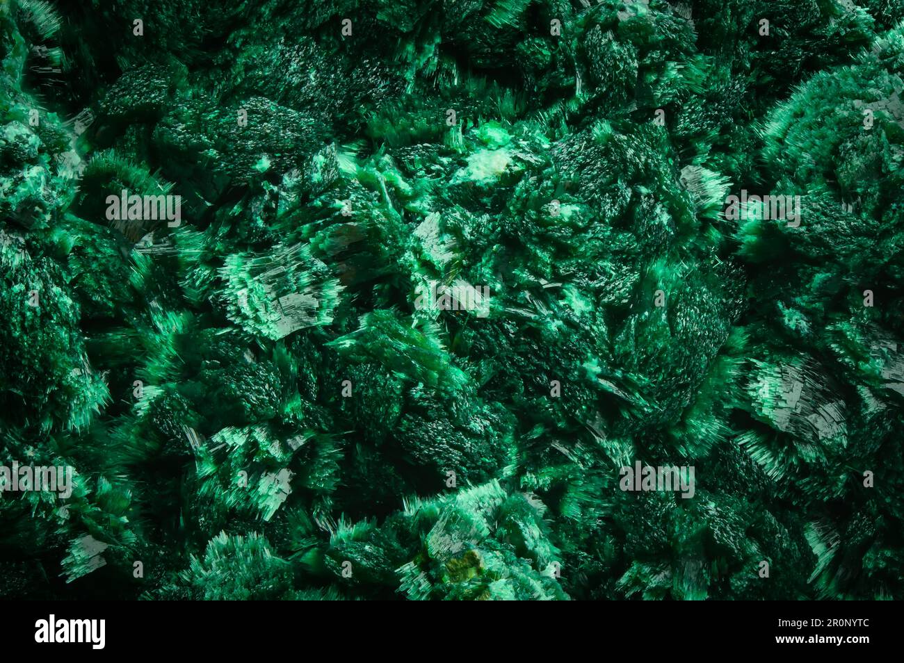 Malachite. green macro detail texture background. close-up raw rough unpolished semi-precious gemstone Stock Photo