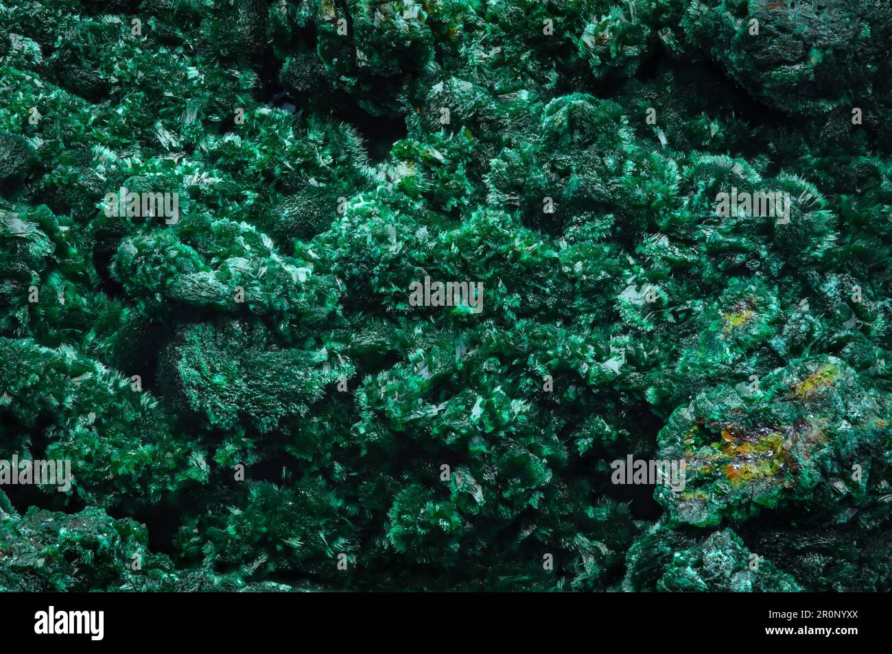 Malachite. green macro detail texture background. close-up raw rough unpolished semi-precious gemstone Stock Photo