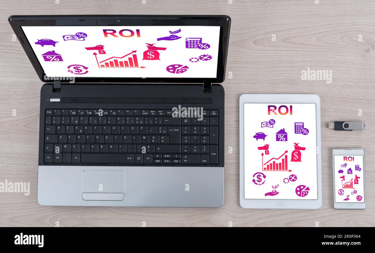 Roi concept shown on different information technology devices Stock Photo