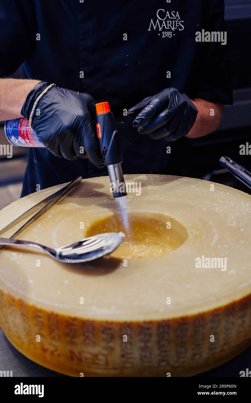 wheel of a large Parmesan cheese used to prepare the pasta sauce Stock