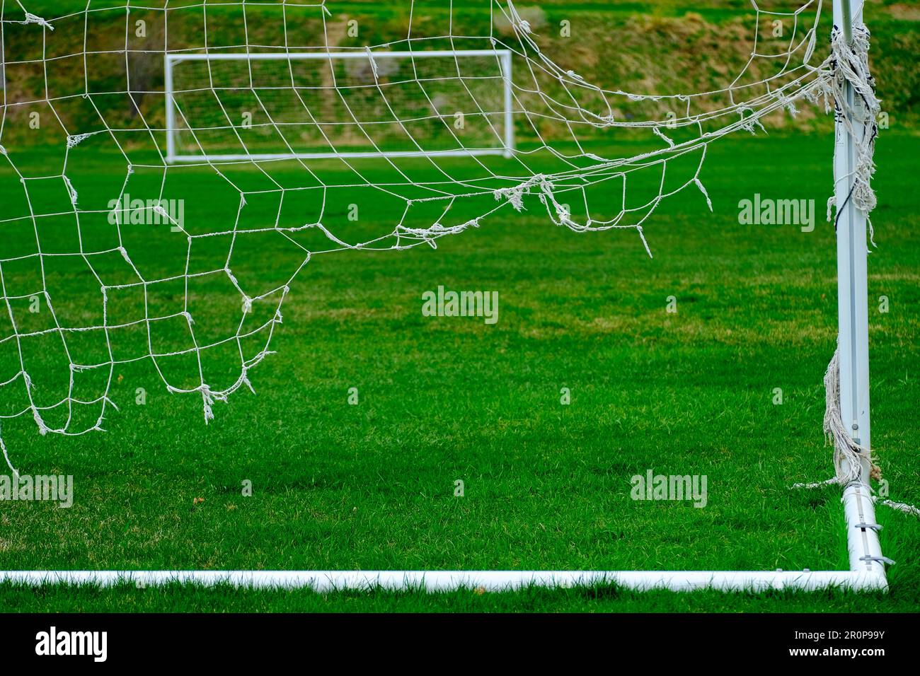 Frayed soccer net hires stock photography and images Alamy