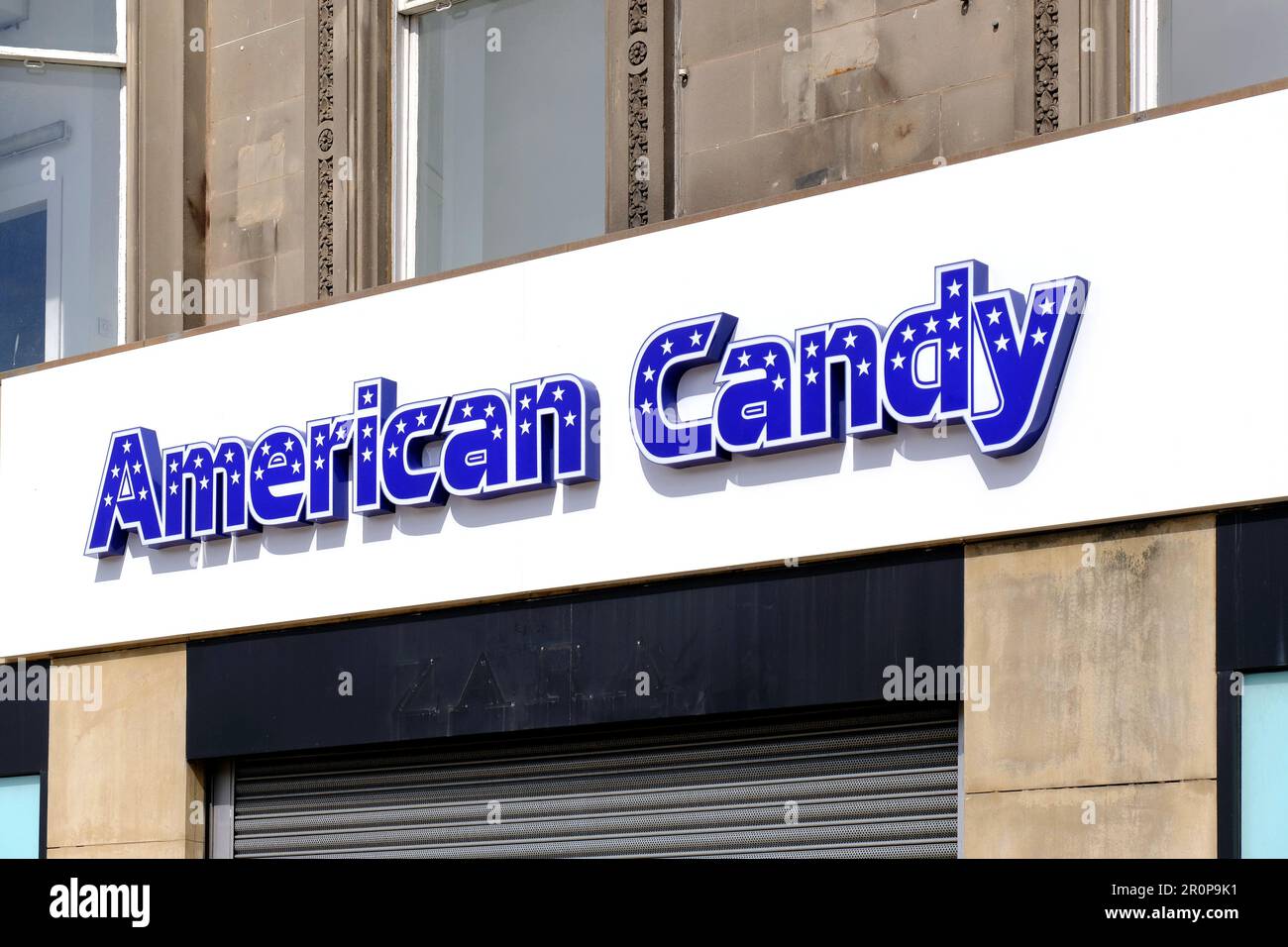 American Candy shop sign, retailer of sweets and candy, Princes Street, Edinburgh Scotland Stock Photo