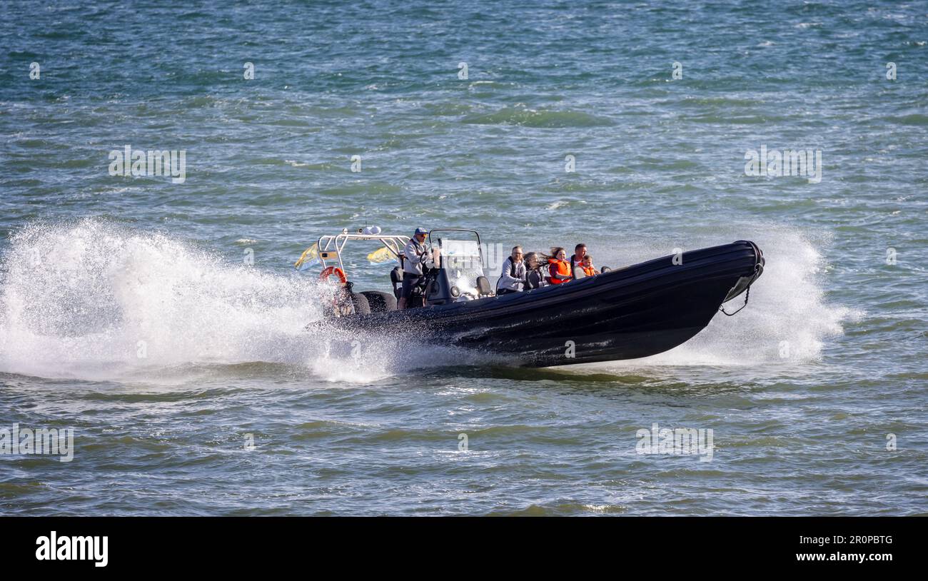 High speed ocean rib ride at West Bay, Dorset, UK on 7 May 2023 Stock Photo Alamy