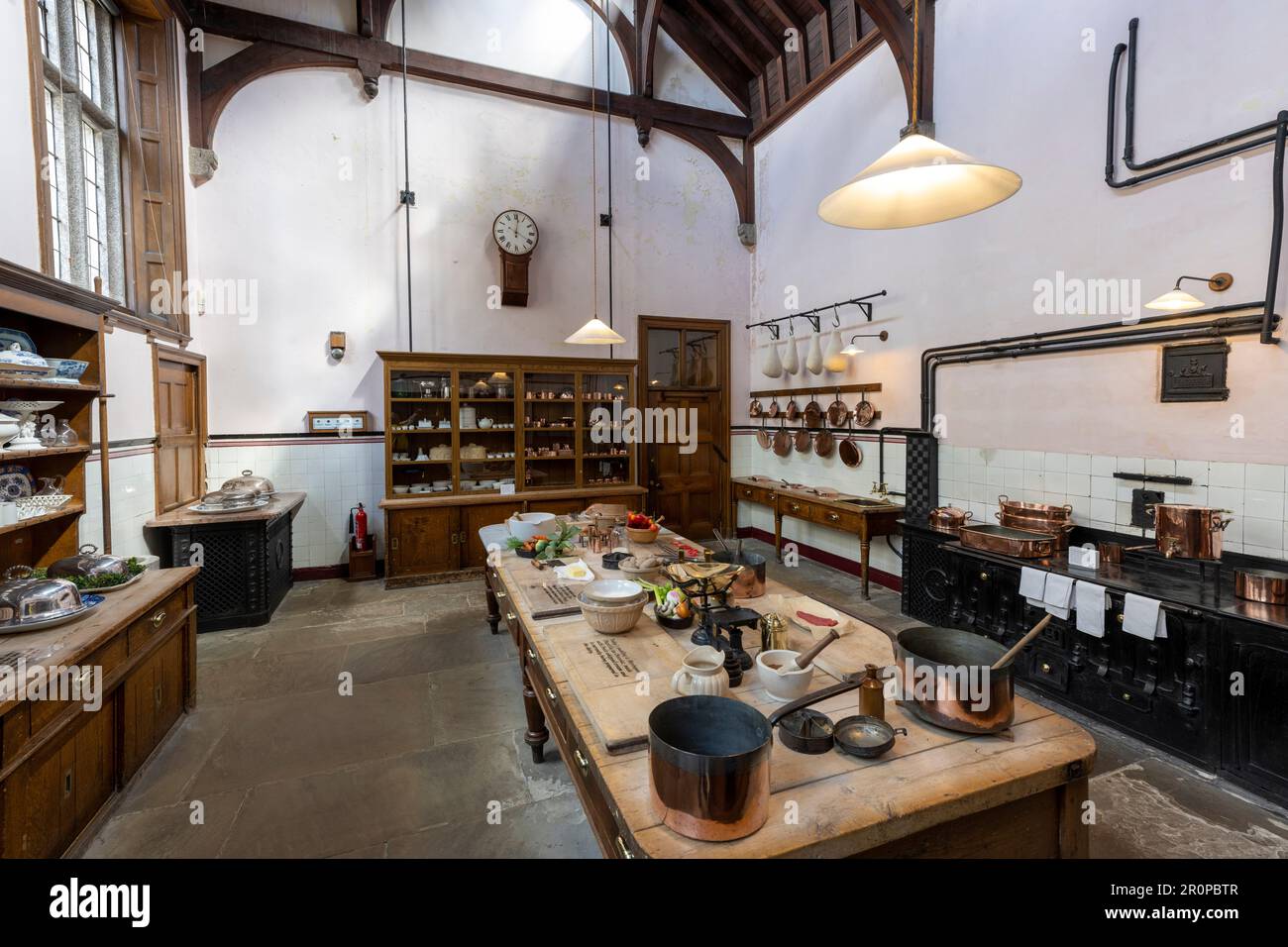 The quintessential  country house kitchen at Lanhydrock House, Lanhydrock, Cornwall, England, UK Stock Photo