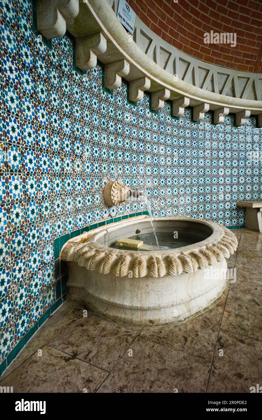 The Moorish Fountain on the Volta do Duche road in the centre of Sintra is a fresh water source Stock Photo