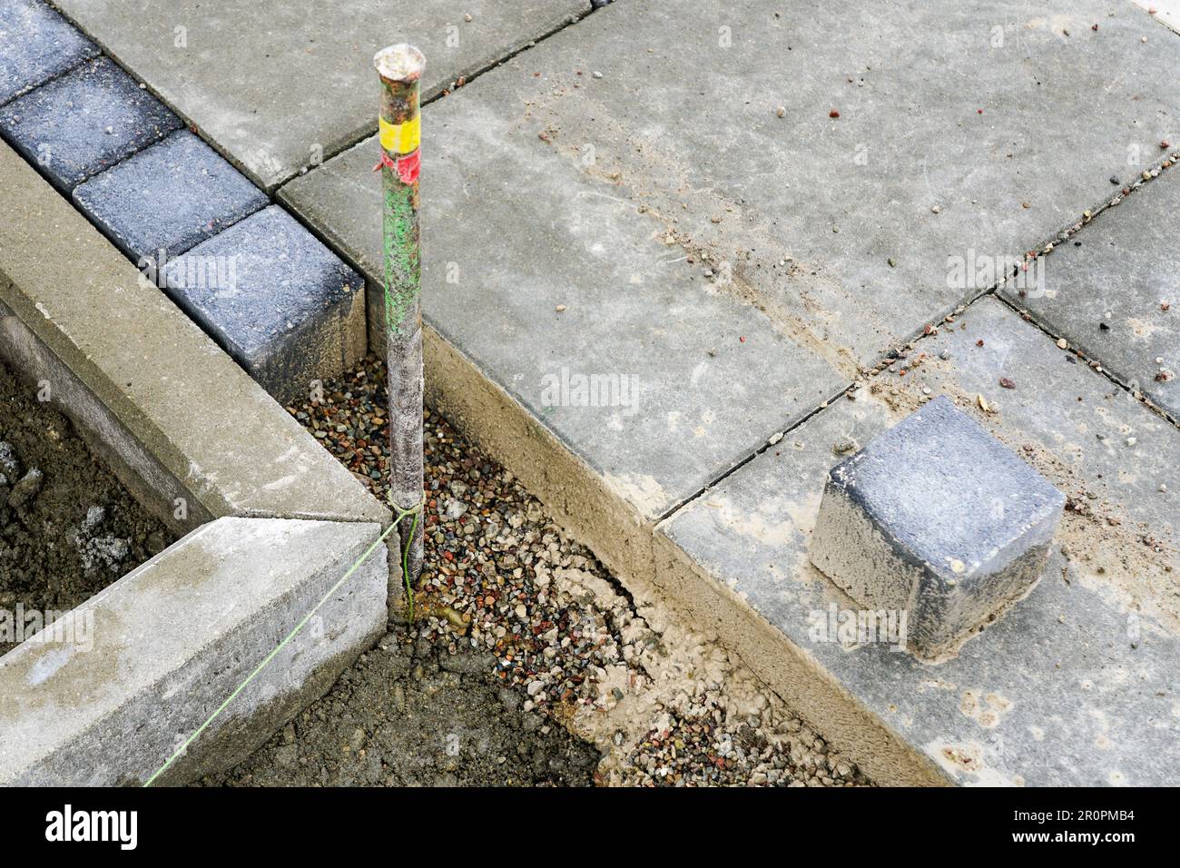Fragment of the construction site of a new unfinished pavement