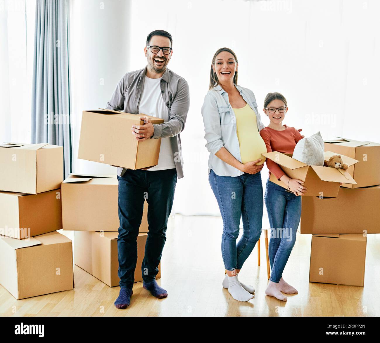 child family box home house moving happy apartment pregnant mother