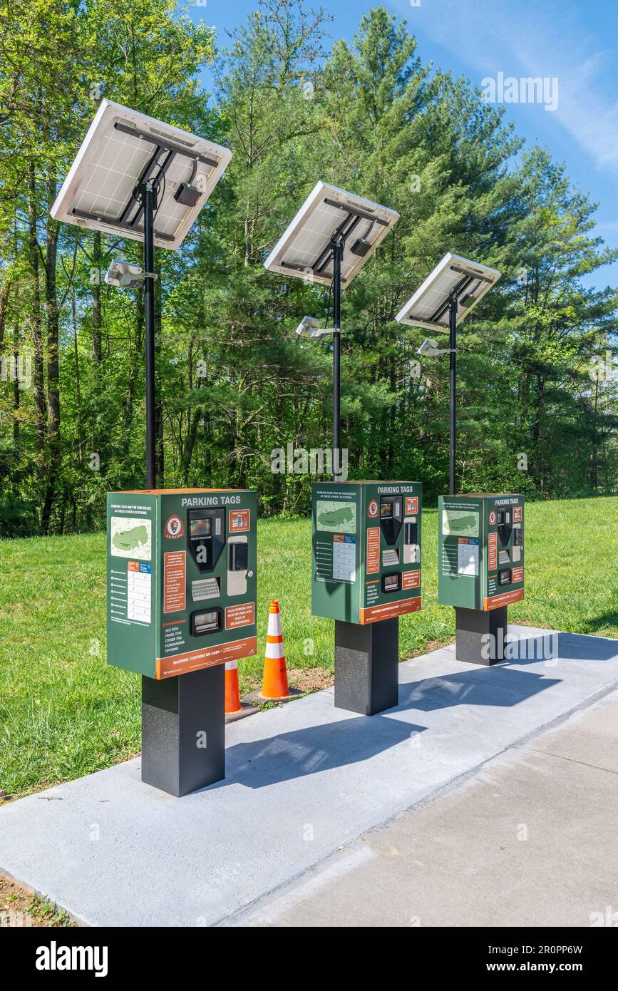 Cades Cove, Tennessee, United States – April 24, 2023: Vertical shot of three Great Smoky Mountains National Park solar powered parking tags vending m Stock Photo