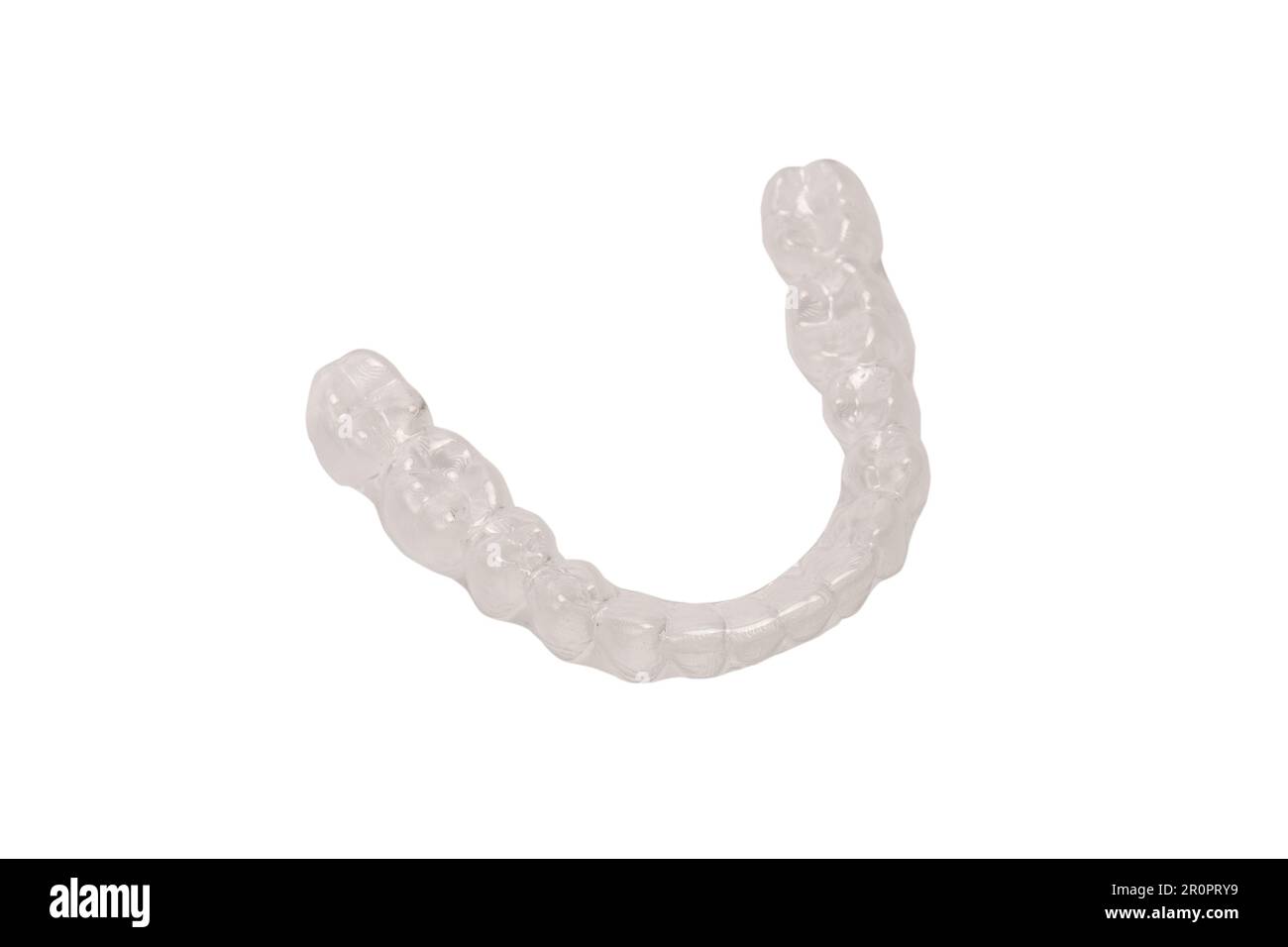 Transparent mouth guard isolated on a white background. Stock Photo