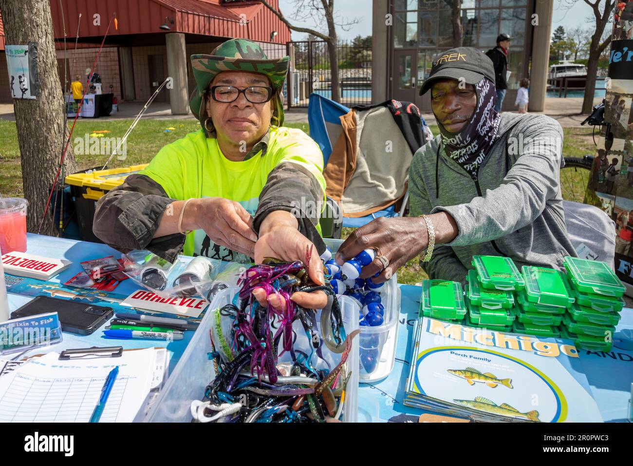 Detroit, Michigan - Members of 'We Fixin to Fish' show lures and other equipment at Milliken State Park. The group teaches children 'the basics and jo Stock Photo