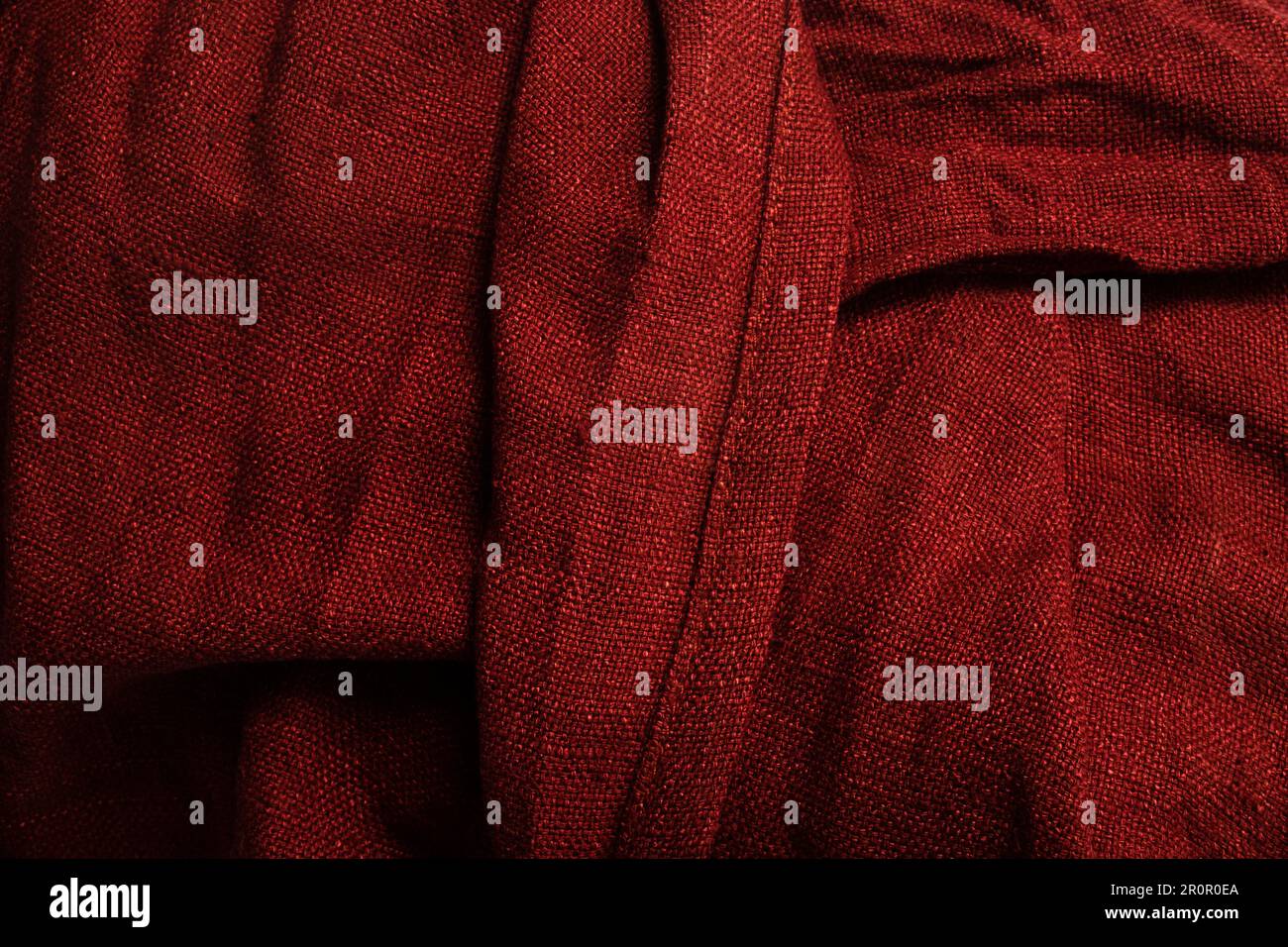 close up of folded red silk texture background Stock Photo