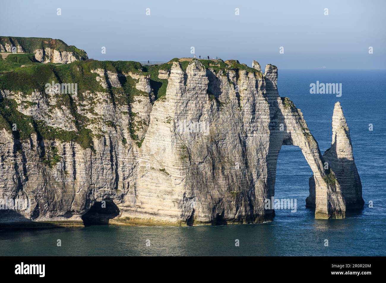 Etretat between historic city, beach of pebbles and cliffs on the cote ...