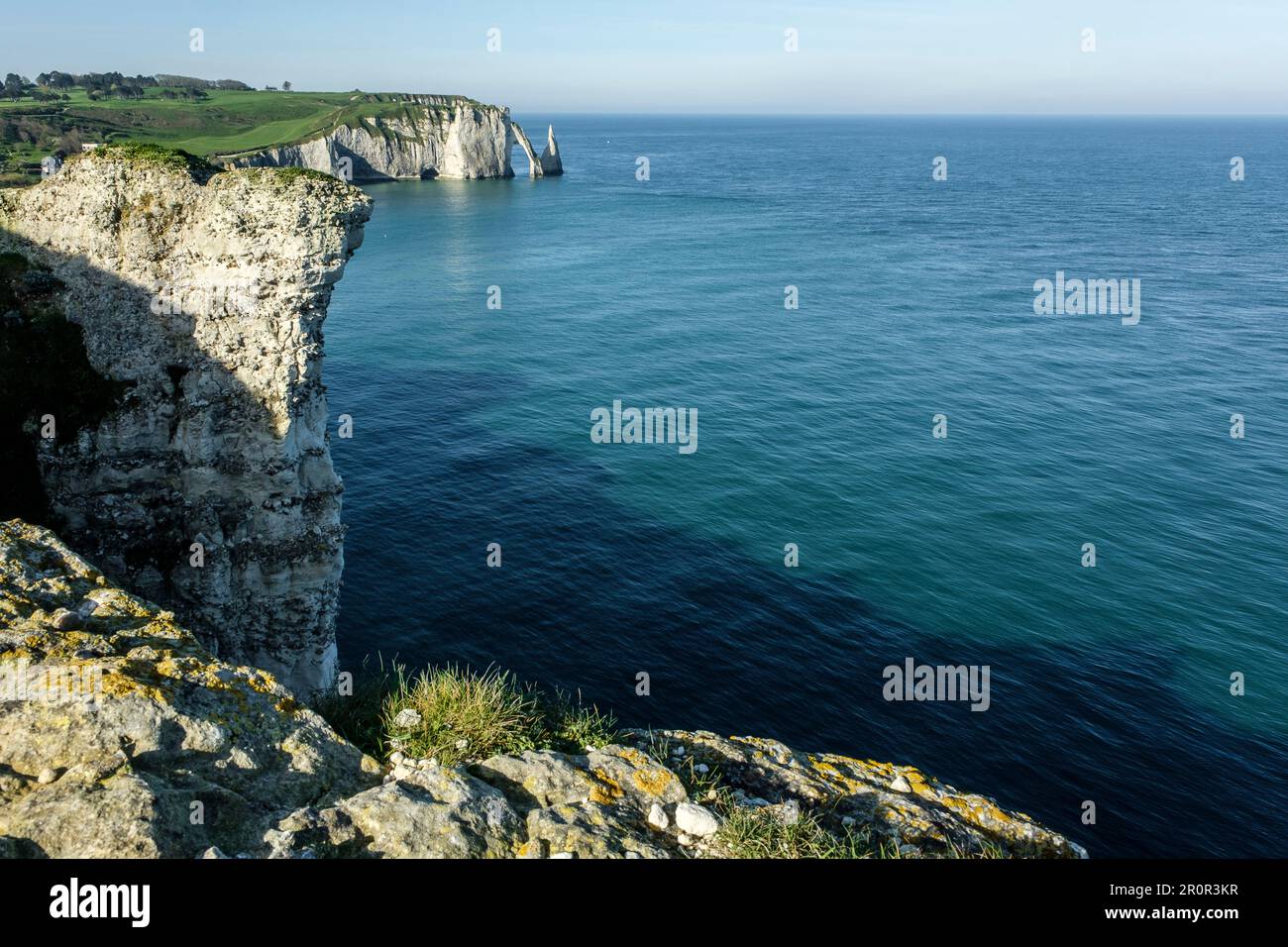 Etretat between historic city, beach of pebbles and cliffs on the cote ...